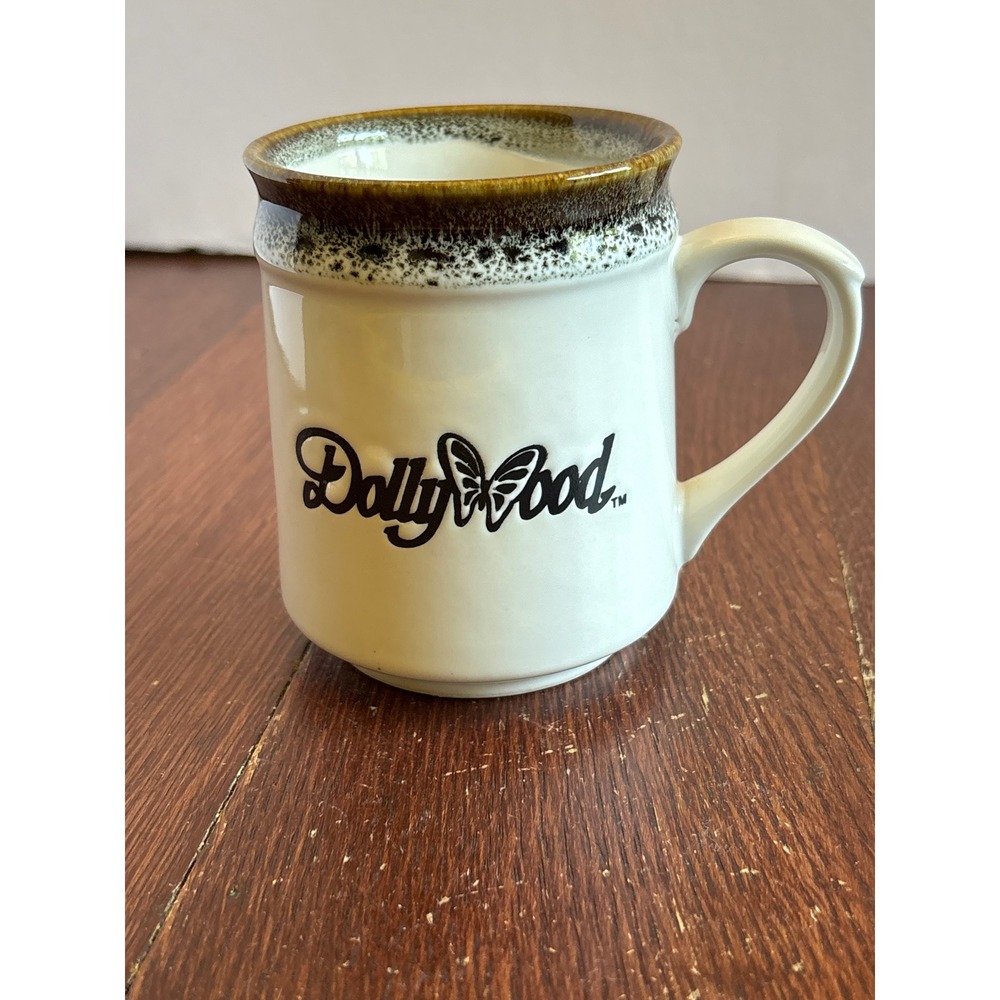 Vintage Dollywood Coffee Mug Made in Japan Butterfly Logo Speckled Rim Cream